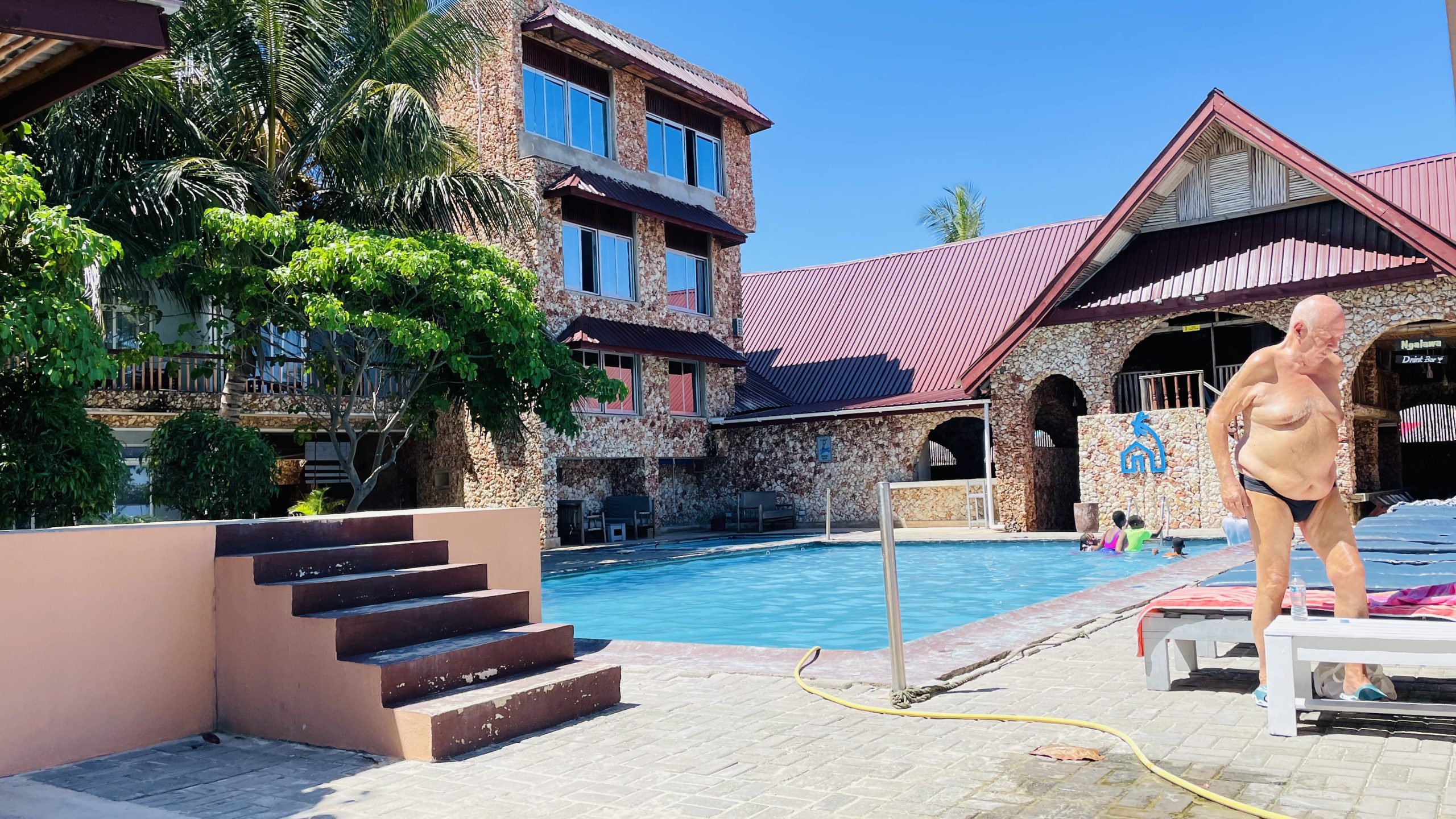Serene Beach Resort — pool deck and ocean view